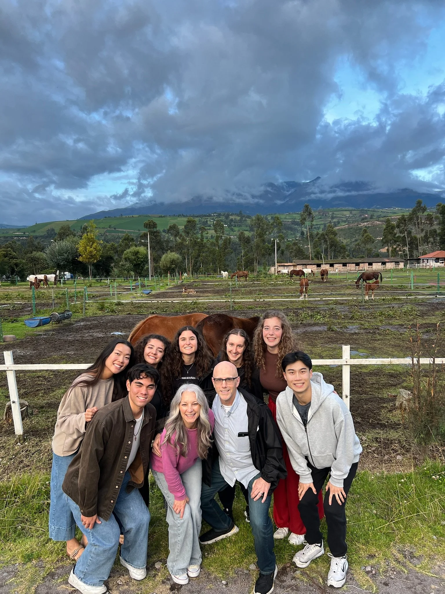 North American nursing students in front of a horse in Quito Ecuador
