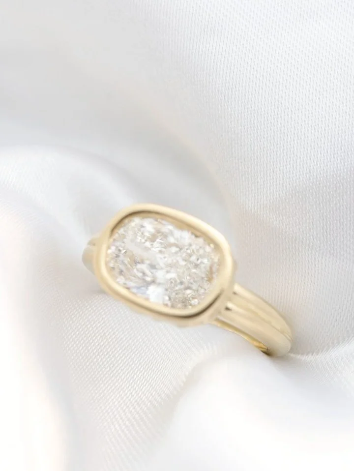 One of my recent engagement ring creations for an amazing couple! ✨ Bezel set with gold detailing around the bezel, in a double style band with engraving on the inside. Every part of this ring design was made with meaning. 

Absolutely love when my c