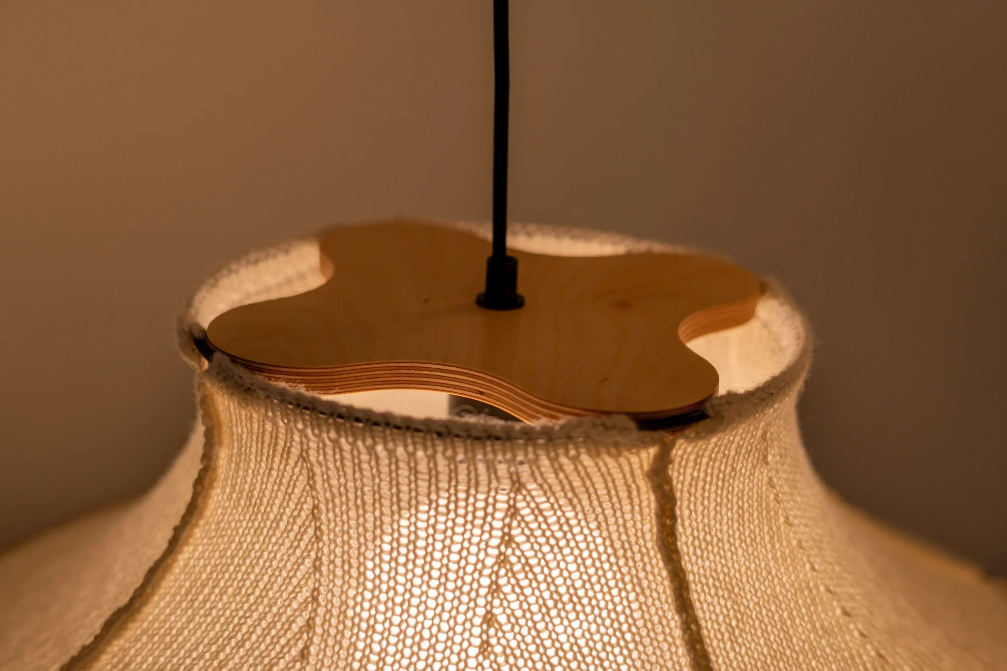 Our new frame shape, designed to hold and support Hiwa and Bloem, is a direct response to the four-panel structure of the knit and the larger blooming form of these lights. As the shades expand in size and weight, the frame has been carefully develop