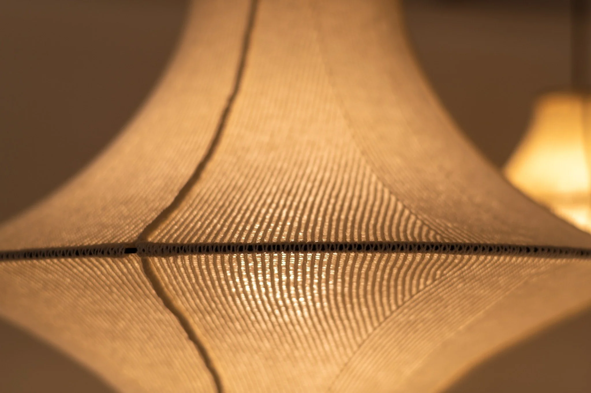 We often hear our lights are more beautiful in real life &mdash; something about the wool, the texture, the way they hold light. Not everything translates through a screen. This is one of those things.

Hiwa is available in five sizes: ⌀400mm ⌀600mm 