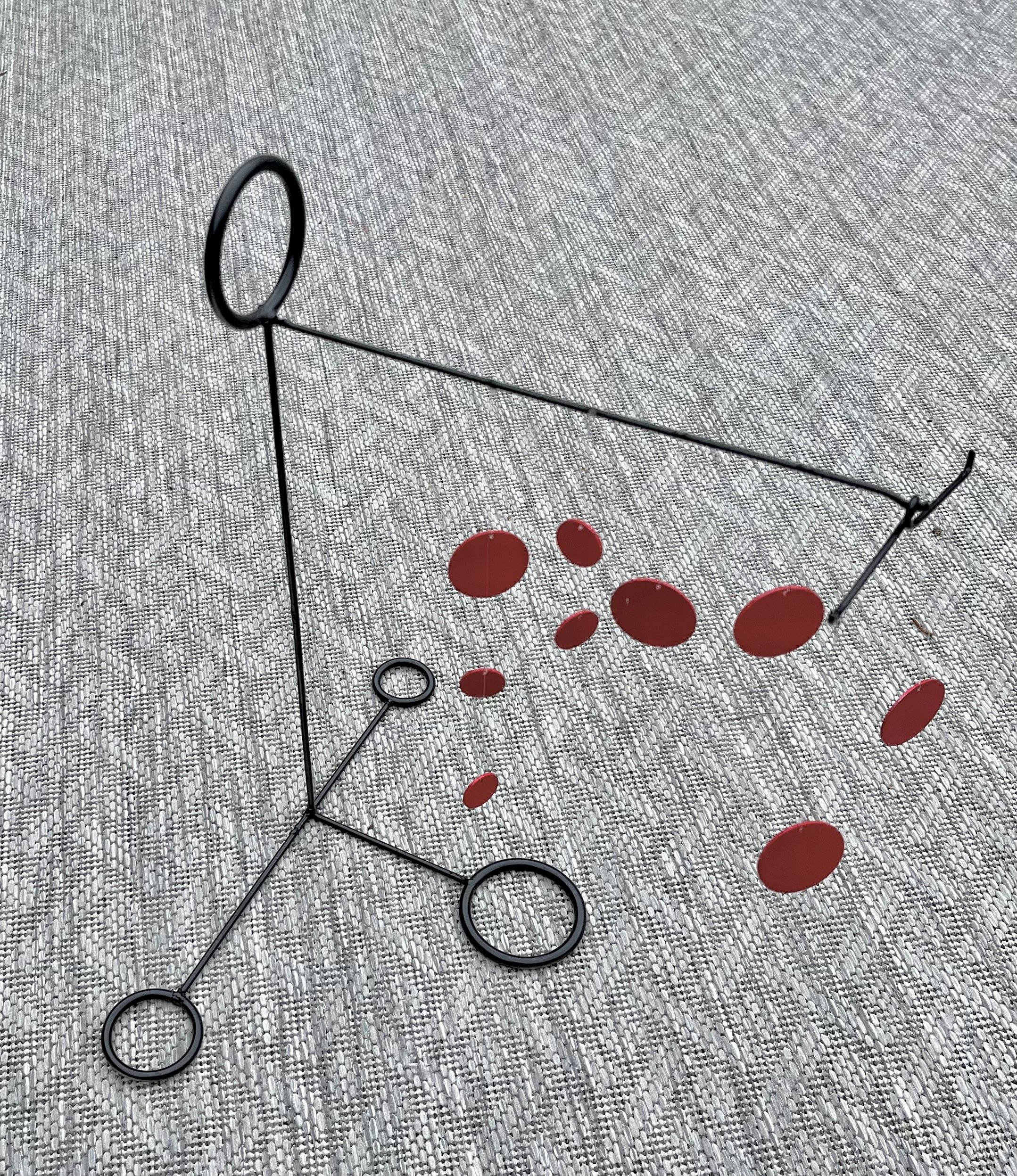 "Red Disc Mobile" by Gene Jones