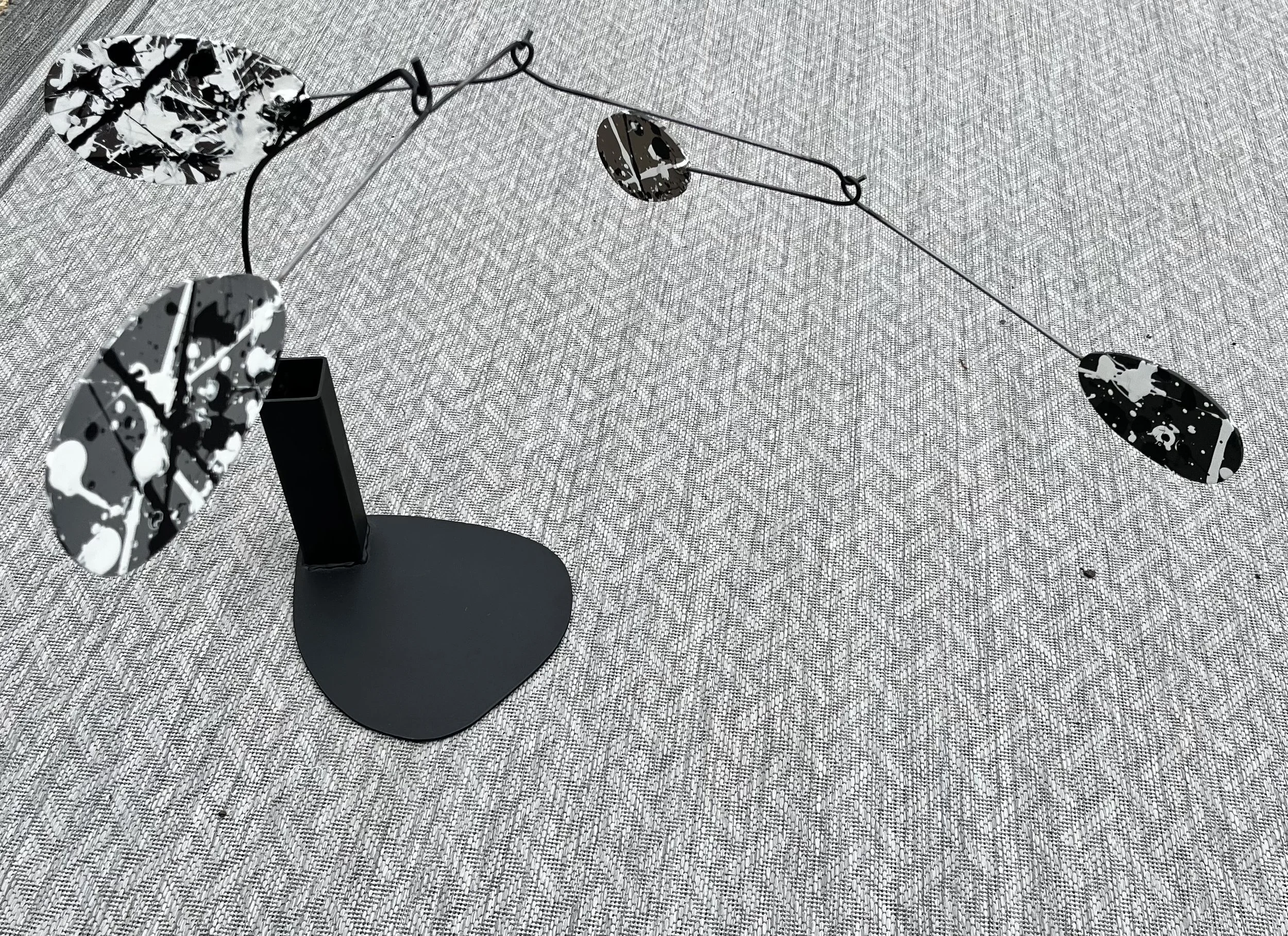 "Greyscale Metal Moblie" by Gene Jones