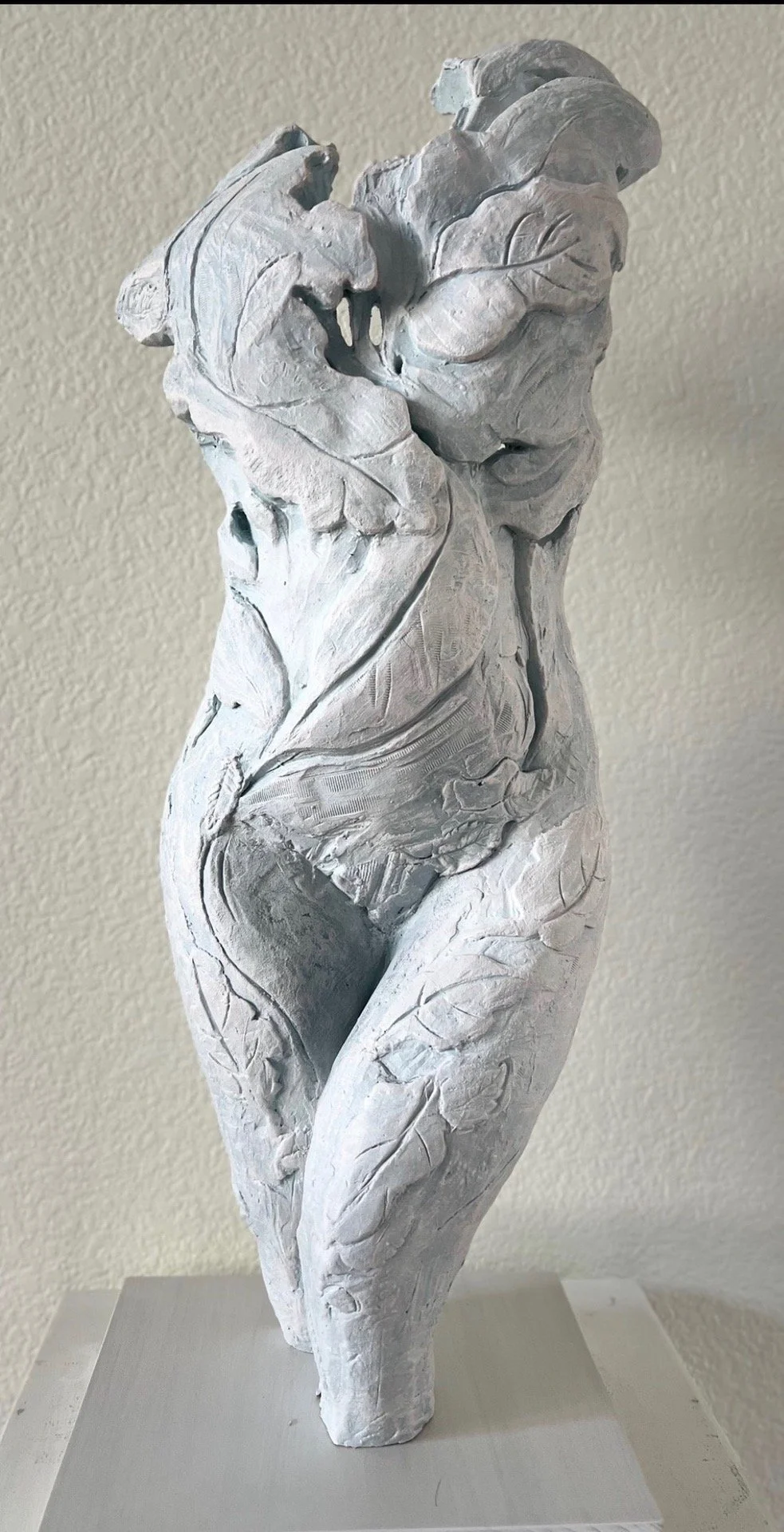 "Bust In foliage" by Ramak Baghaie