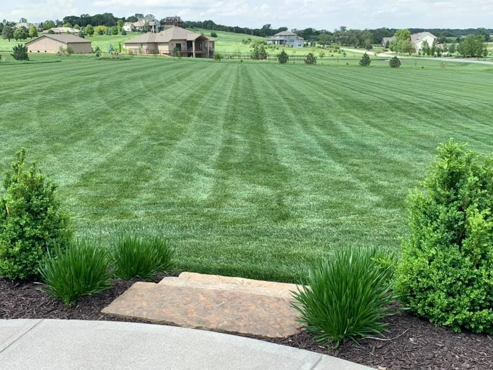 Country Inspired Landcapes Fertilizing.jpg