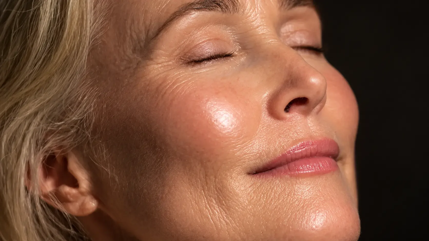Woman with glosing skin