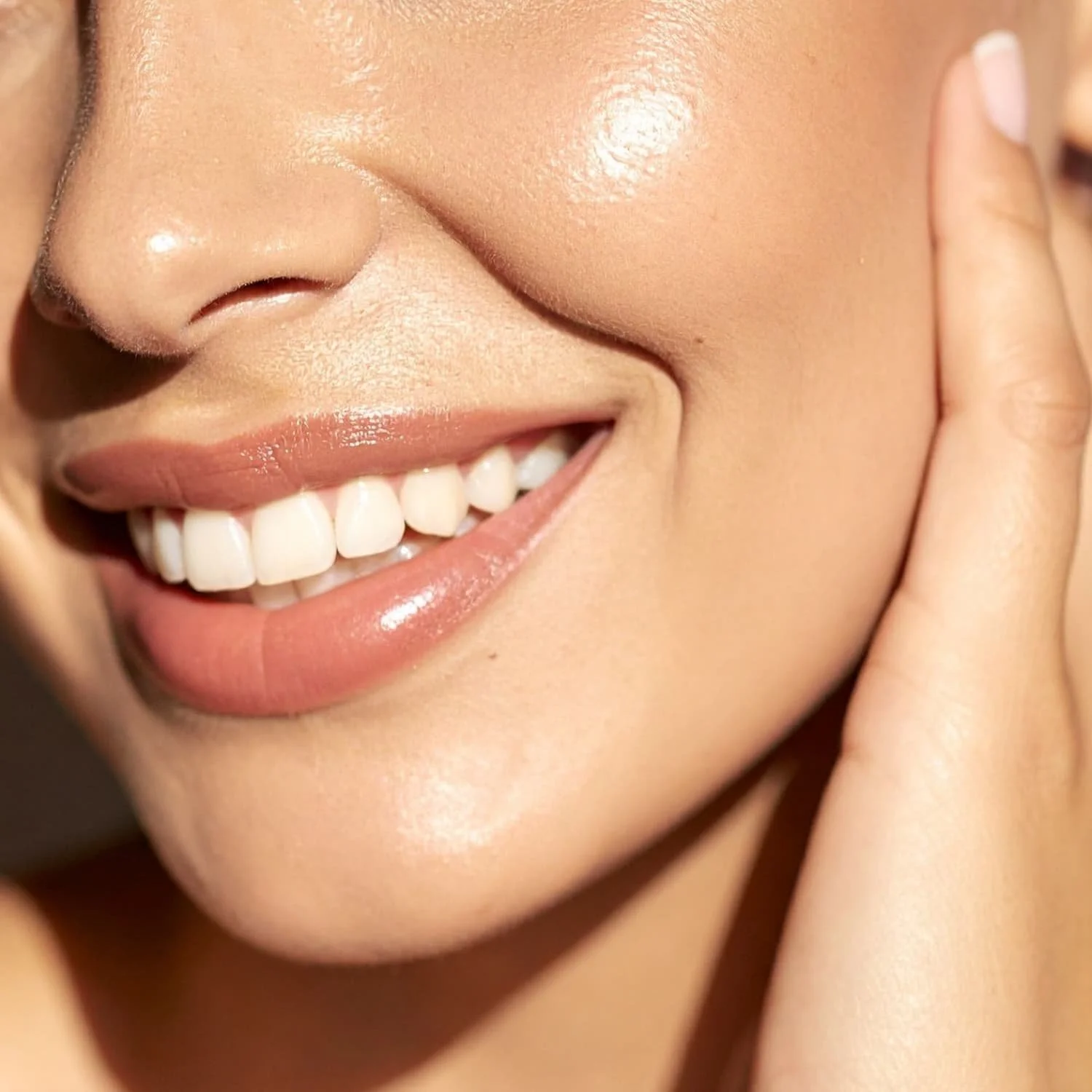 Woman smiling with smooth skin