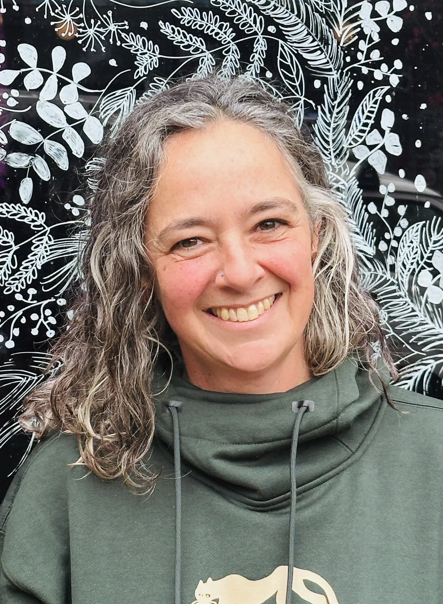 Smiling woman with curly hair