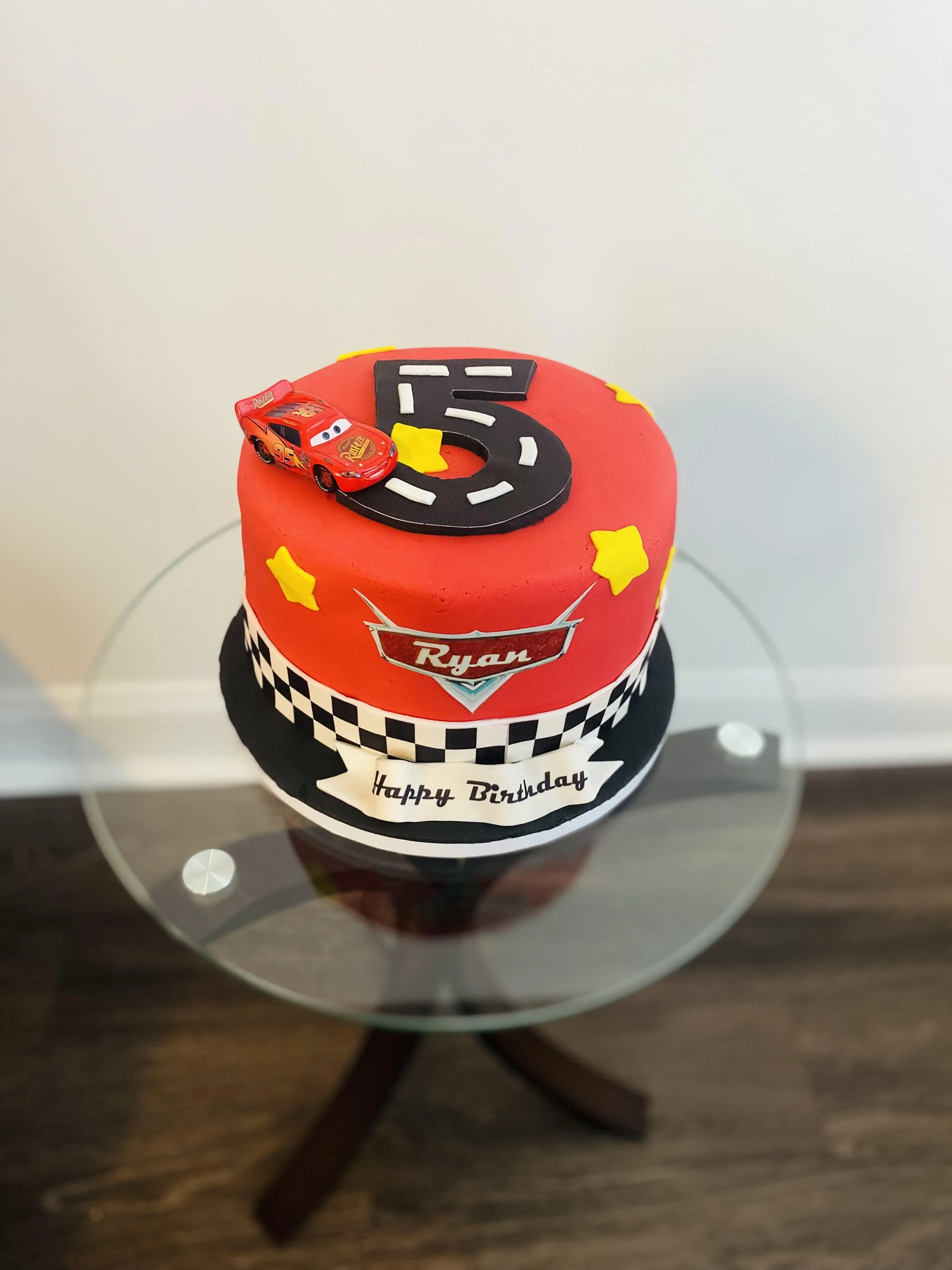 Cars Lightning McQueen cake, Vanessa Sencherey, chocolate cake near me, black bakery near me, cupcake store, monogram cake toppers, queen city bakery, black owned dessert shops