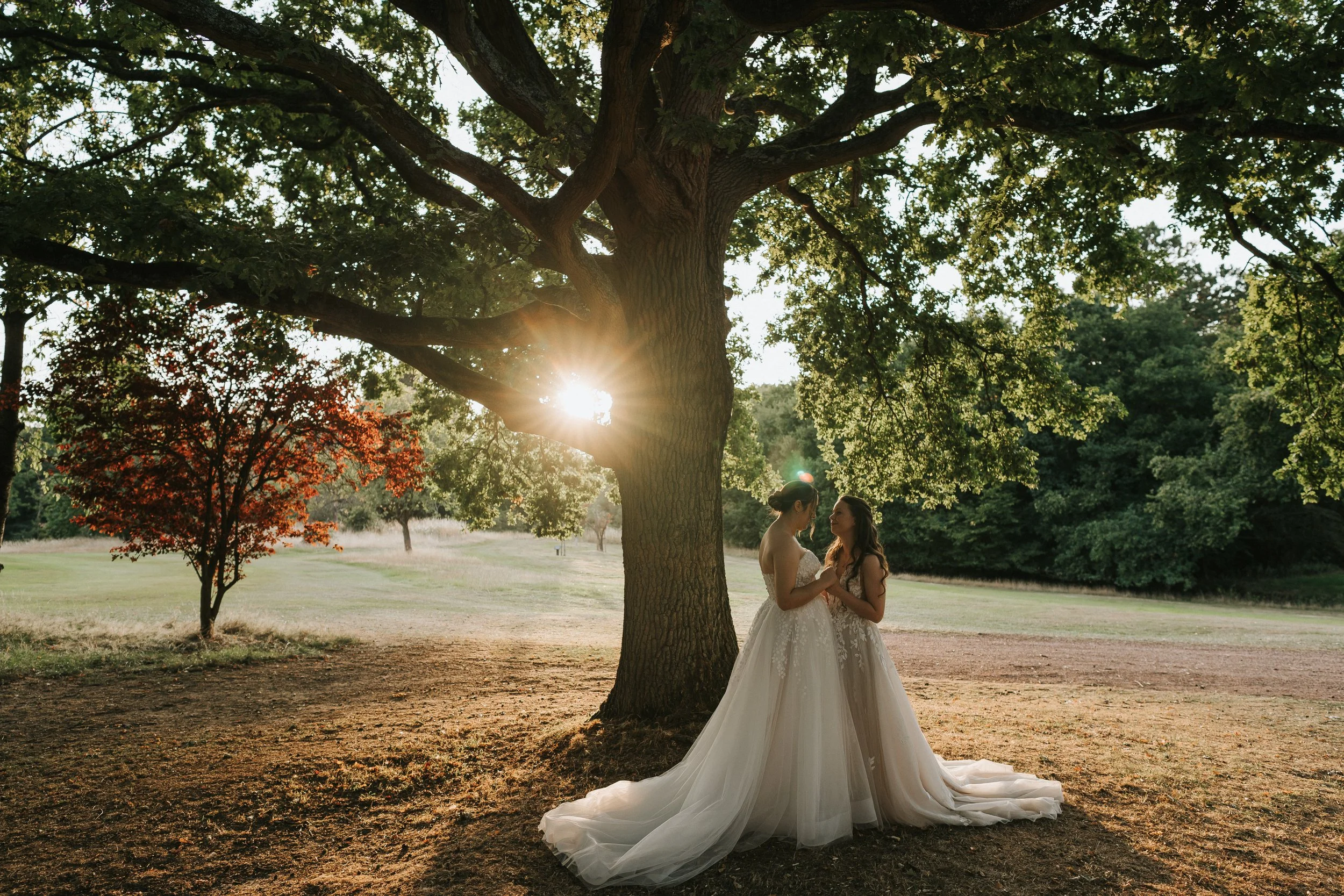 Two brides at golden hour on their wedding day