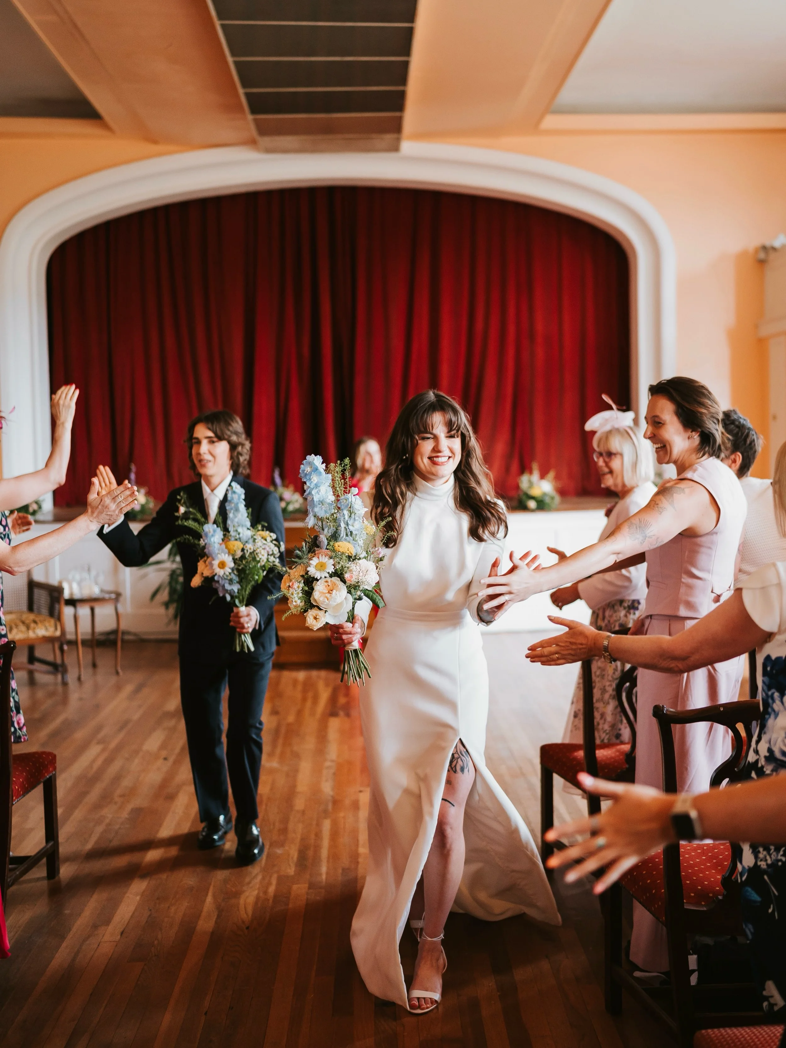 Jo (she/her) &amp; Em (they/them) and their gorgeous Folkestone Wedding ✨💖
We have so many stunning &amp; fun weddings to share from this year but I&rsquo;m so proud of this gallery! 
These two had a day filled with community &amp; love, a choir sin
