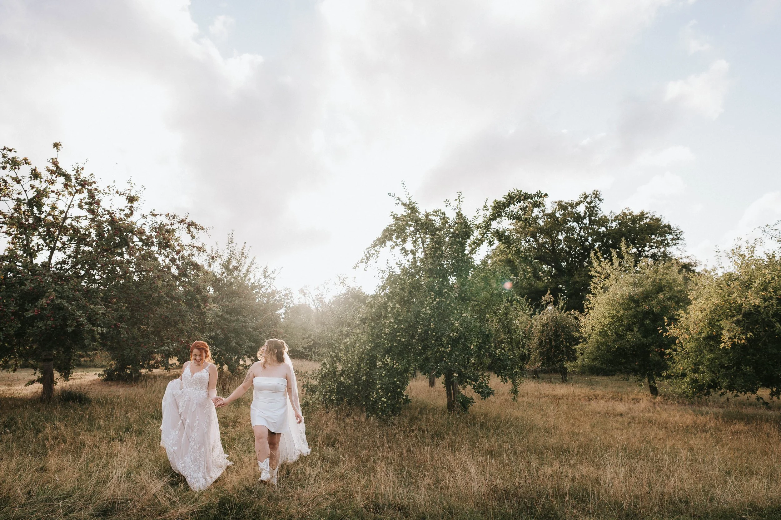 Two brides in wedding dresses on their wedding day