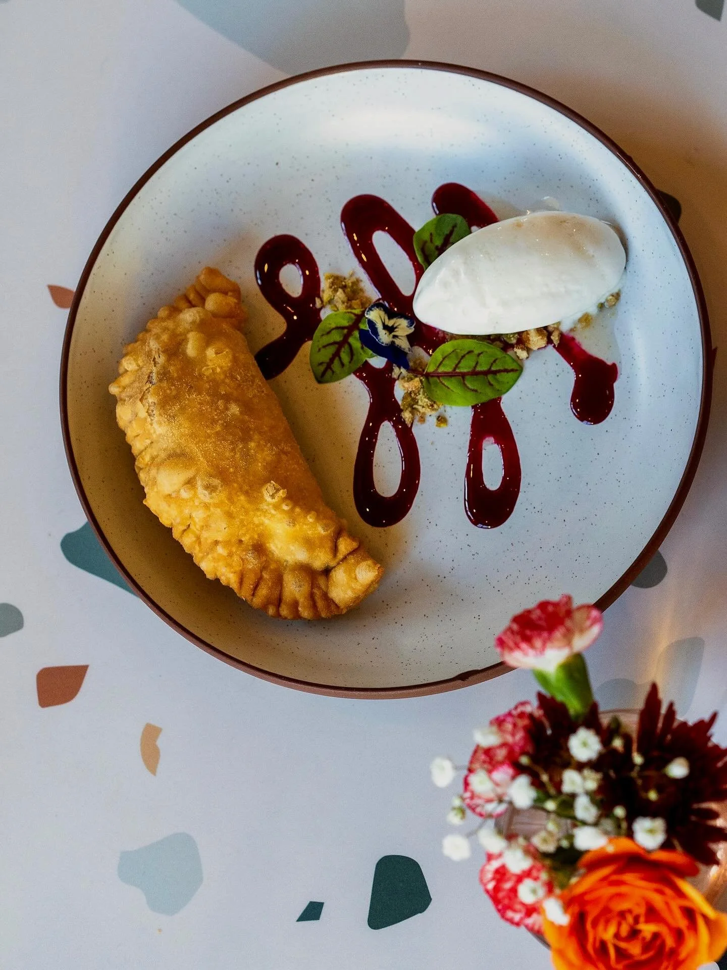 Growing up, Chef&rsquo;s mom made him an apple pie every year for his birthday 🍎 Our seasonal apple empanada is an homage to this core memory, and it&rsquo;s back for a limited time!

We use a medley of GA grown apples, both sweet and tart, giving a