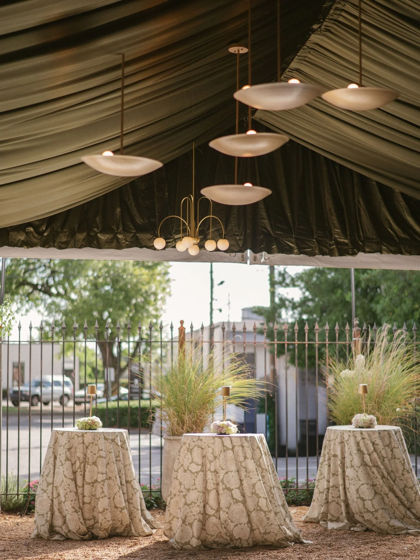 An intimate summer evening for E+N, designed to feel like the best kind of dinner party. Deep olive draping, custom bronze satellite chandeliers, layered shades of green, incredible paella, handcrafted cocktails, and a dance floor that was filled wit