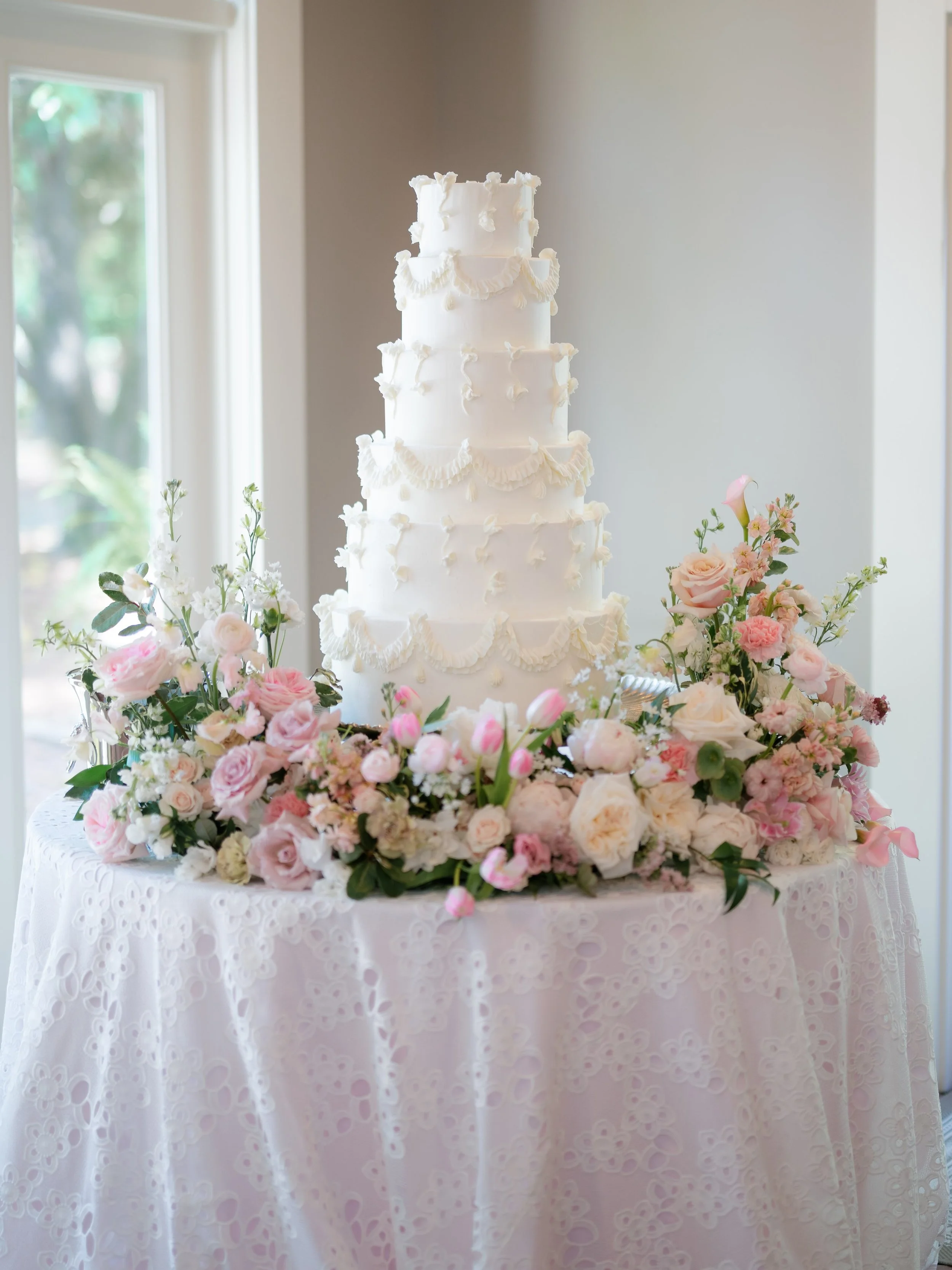A cake table full of texture, dainty details, a meadow of lush pink &amp; green blooms and six tiers of pure perfection. 🤍

#wedding #weddingday #weddinginspiration #weddingcake #weddingplanning
