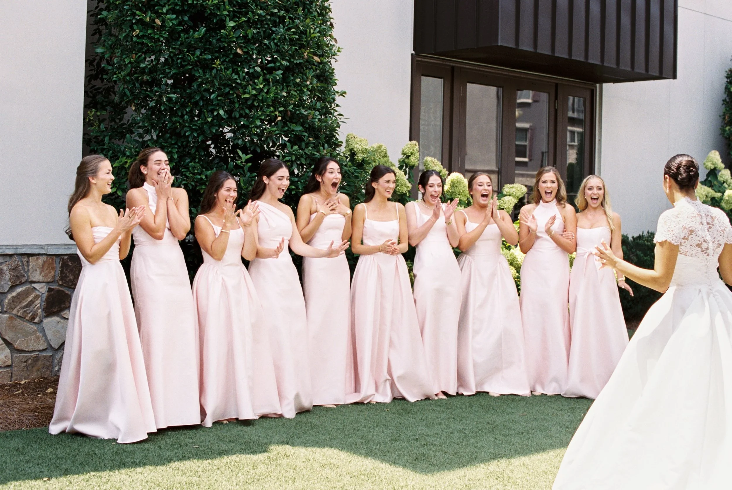 Whitney&rsquo;s girls, seeing her as a bride for the first time💗✨ One of those wedding morning moments you&rsquo;ll remember forever&mdash; when it all starts to feel real. 

#weddingday #bride #bridesmaids #firstlook #weddinginspiration