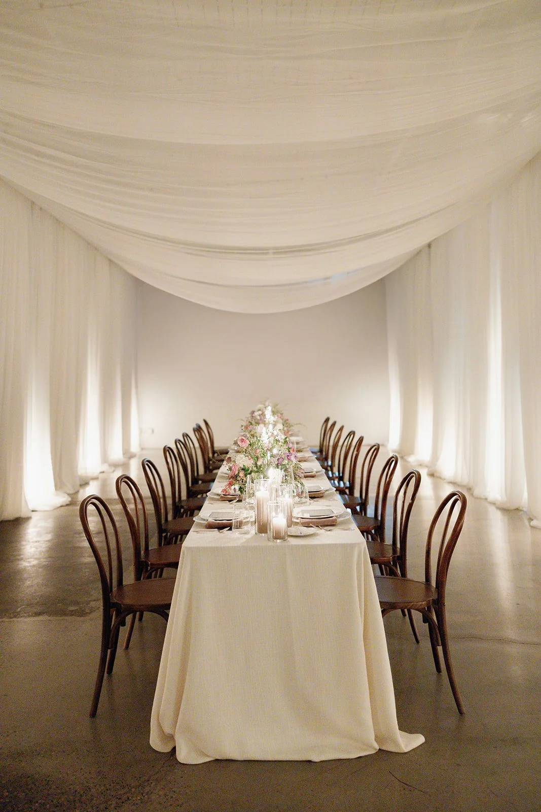 anavo-events-intimate-long-table-dinner-white-draping.jpg