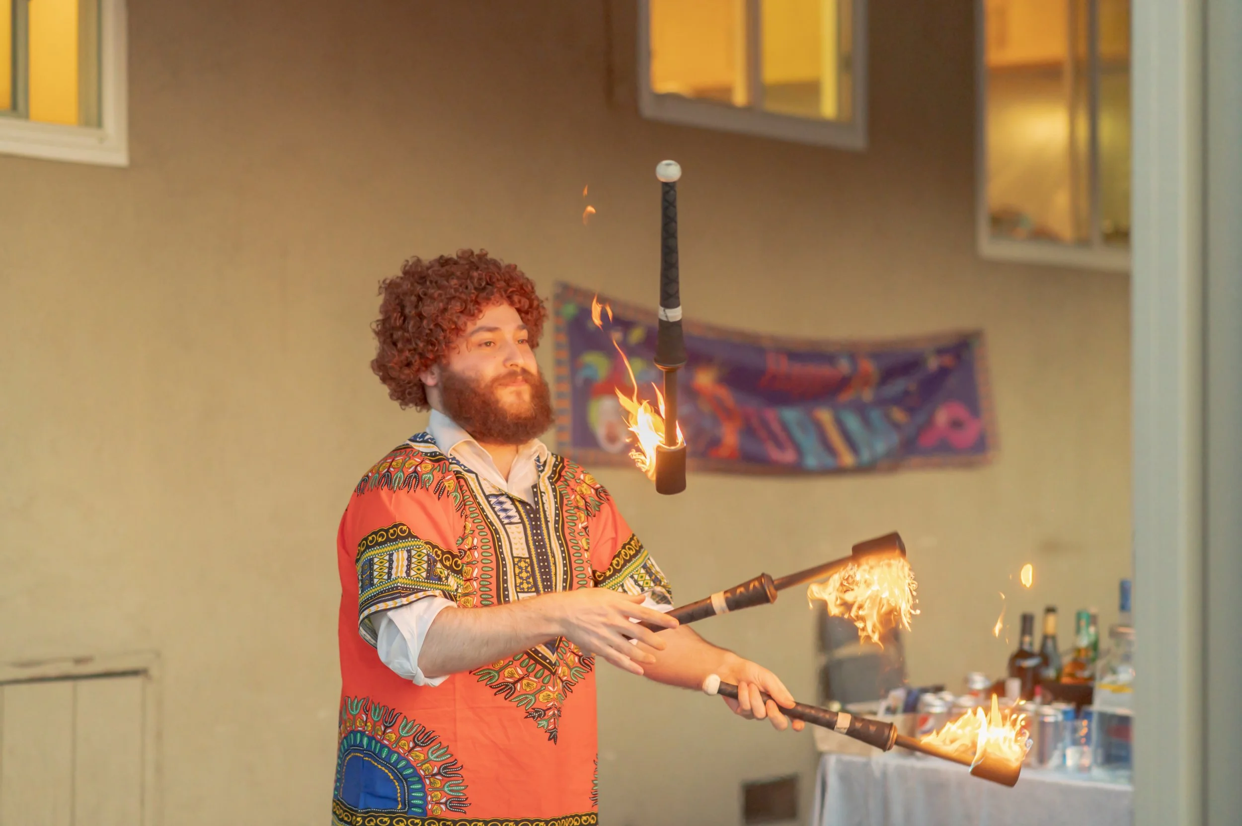 Rabbi Izzy Adelist juggles fire during Purim 2022 at Chabad of Tracy.