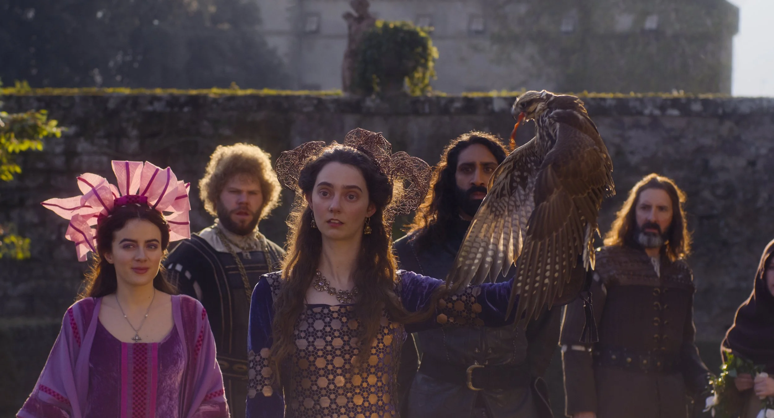 Still image of Neifile, Licisca (holding a falcon on her arm), Dioneo, Tindaro, and Sirisco from Netflix's Decameron