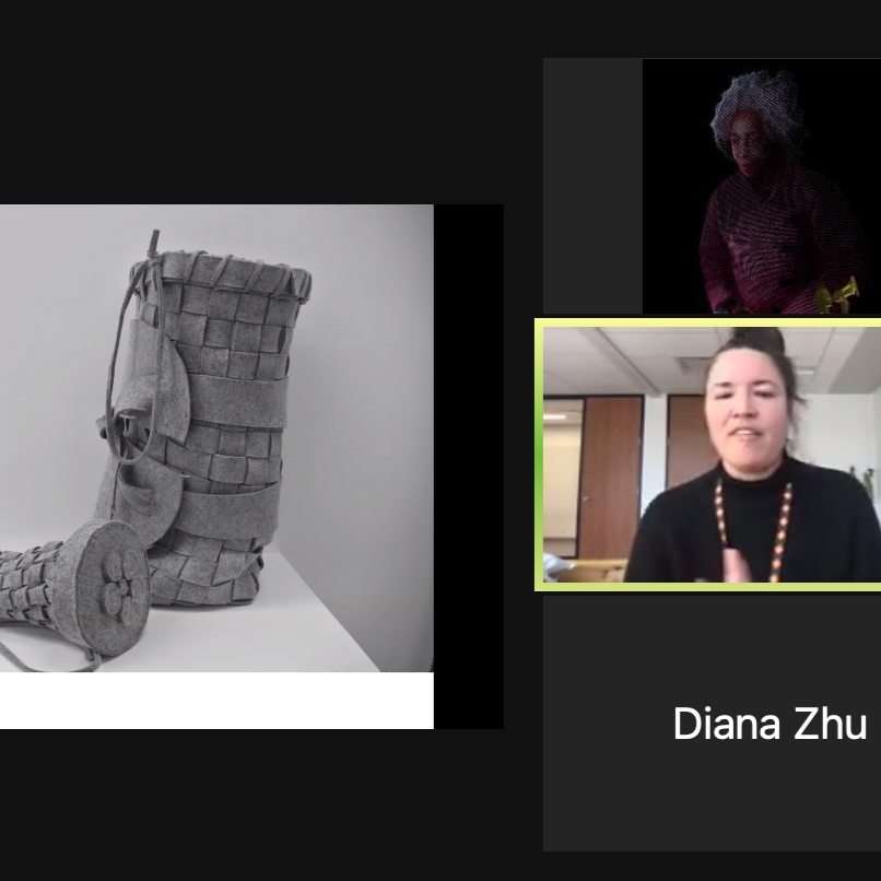 A photo of a Zoom call with a gray museum boot-like object, three panels of zoom attendees or speakers on the right
