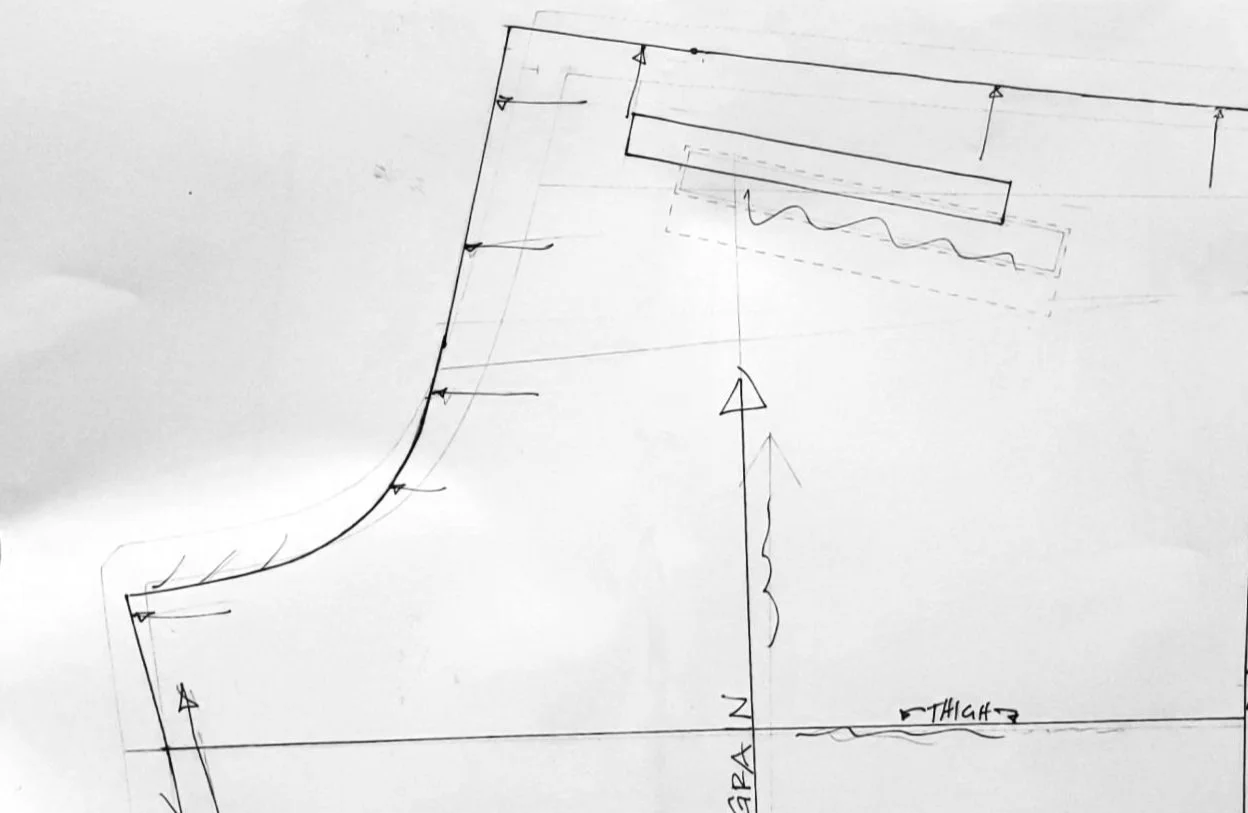 black and white blueprint for the back panel of a pant leg