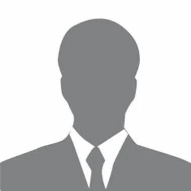 Silhouette of a person in a suit and tie