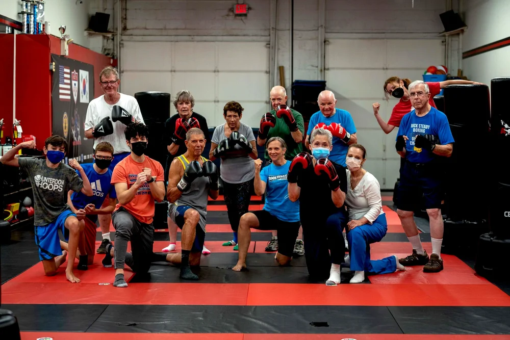 Rock Steady Boxing community members gathered together