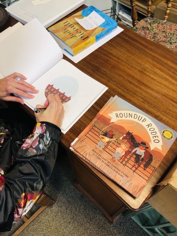 Courtney Shannon Strand autographing  her picture books at Seaport Books LaConner WA.jpg