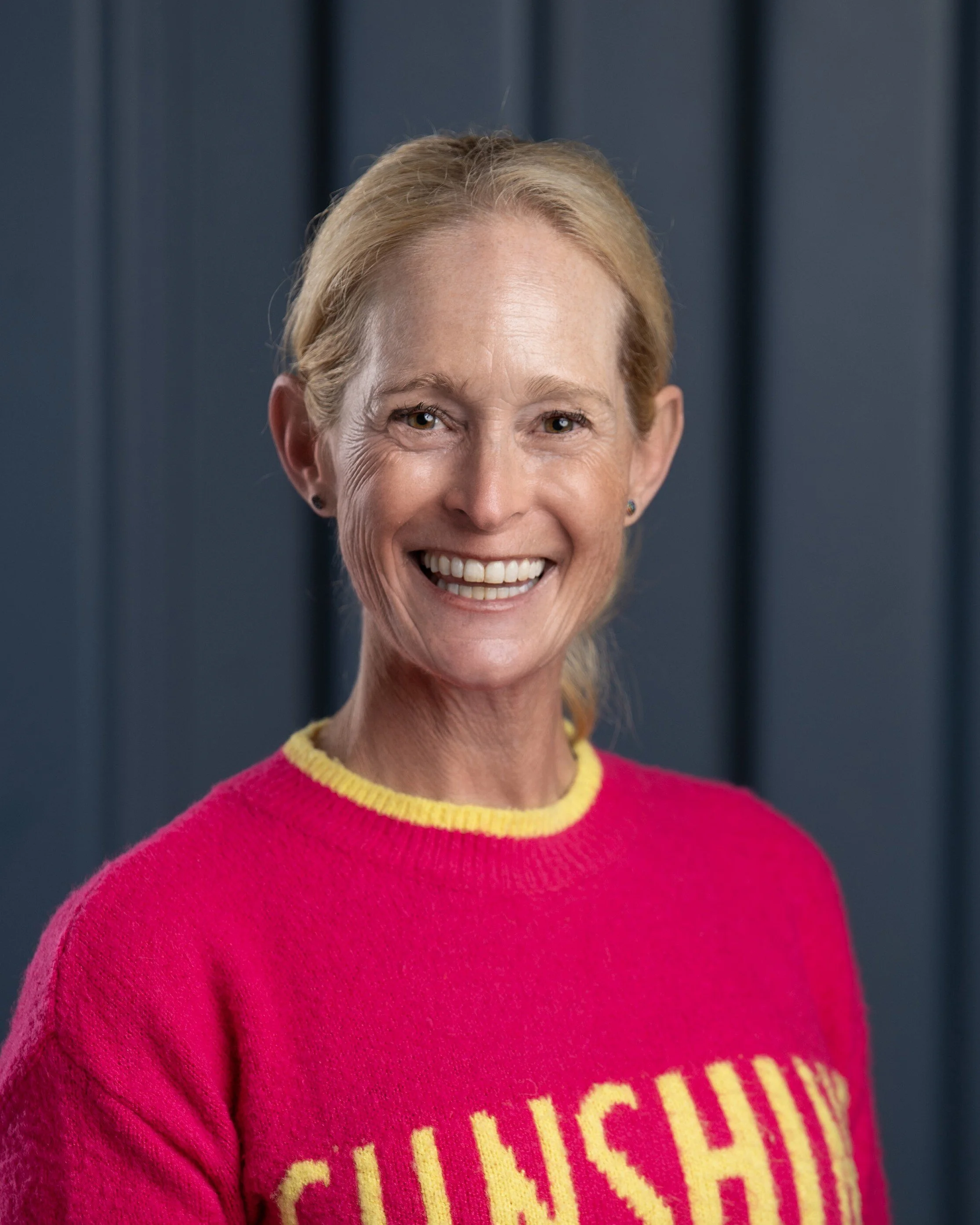 Liz-Sloan-and-puppy-volunteer-coordinator