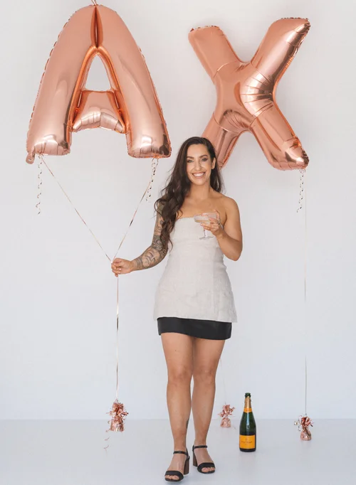 Andrea Cross with AX balloon letters