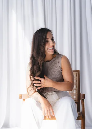 Andrea laughing candidly