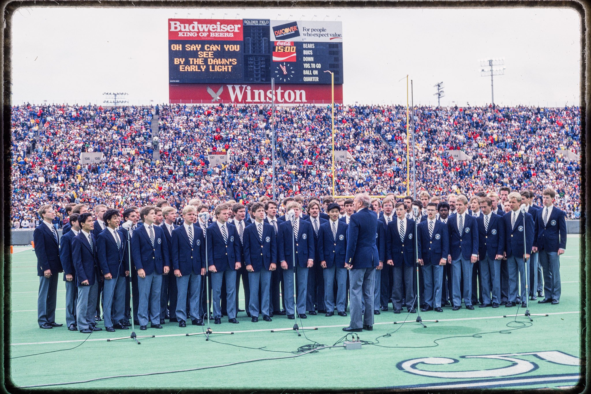 Men's Glee Club singing the national anthem before the Chicago Bears' season opener at Soldier Field, September 20, 1987