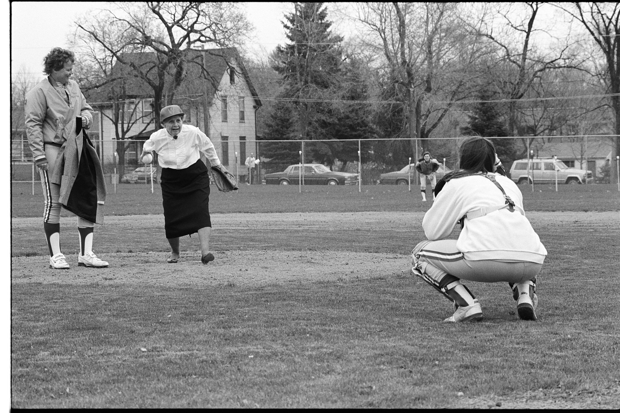 Ruth Berg Leedy '32 throwing out the first pitch at the dedication of Ruth Leedy Field (softball), April 1, 1989