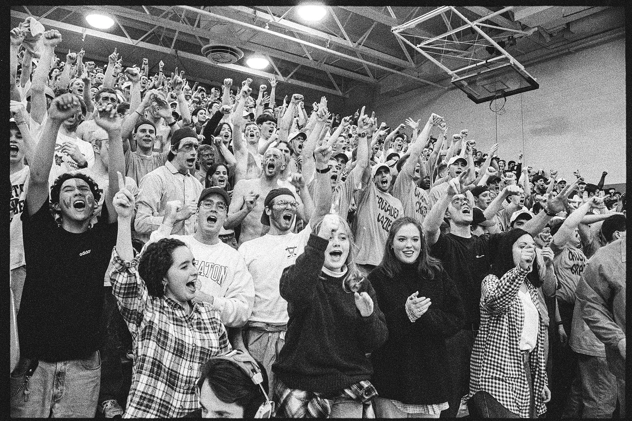 Crusader Crazies pack Centennial Gym to see Men's Basketball defeat Illinois Wesleyan 83-71, February 10, 1996