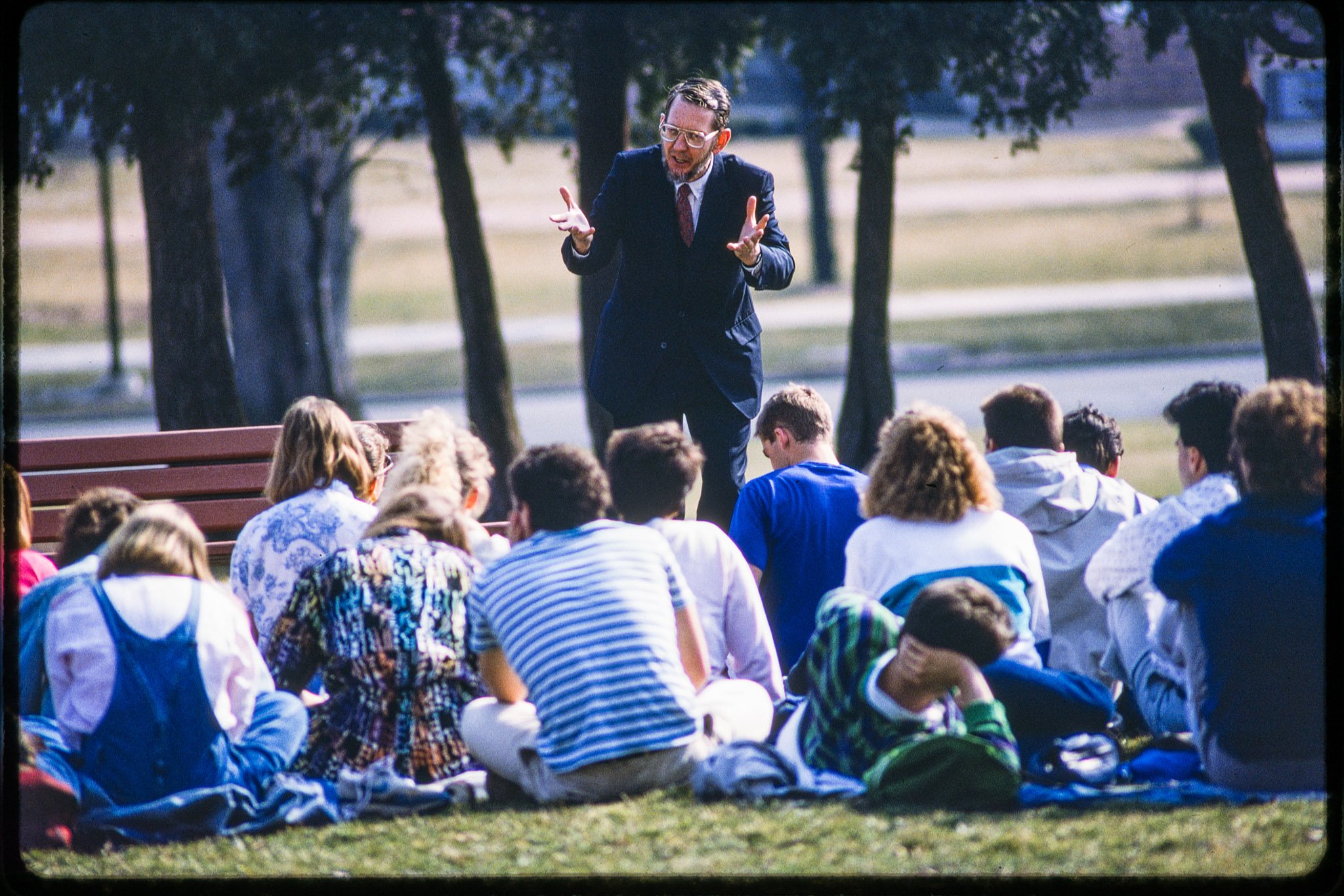 English Literature professor, Dr. Joe McClatchey, teaching on Blanchard Lawn, March 1988