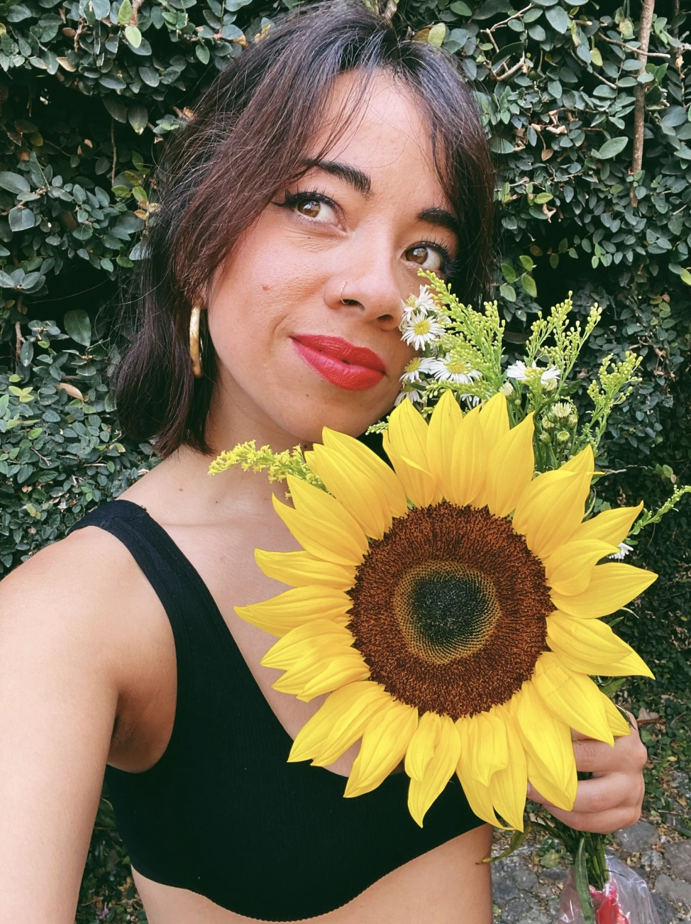 Kim and a sunflower in Tepoztlán, Morelos