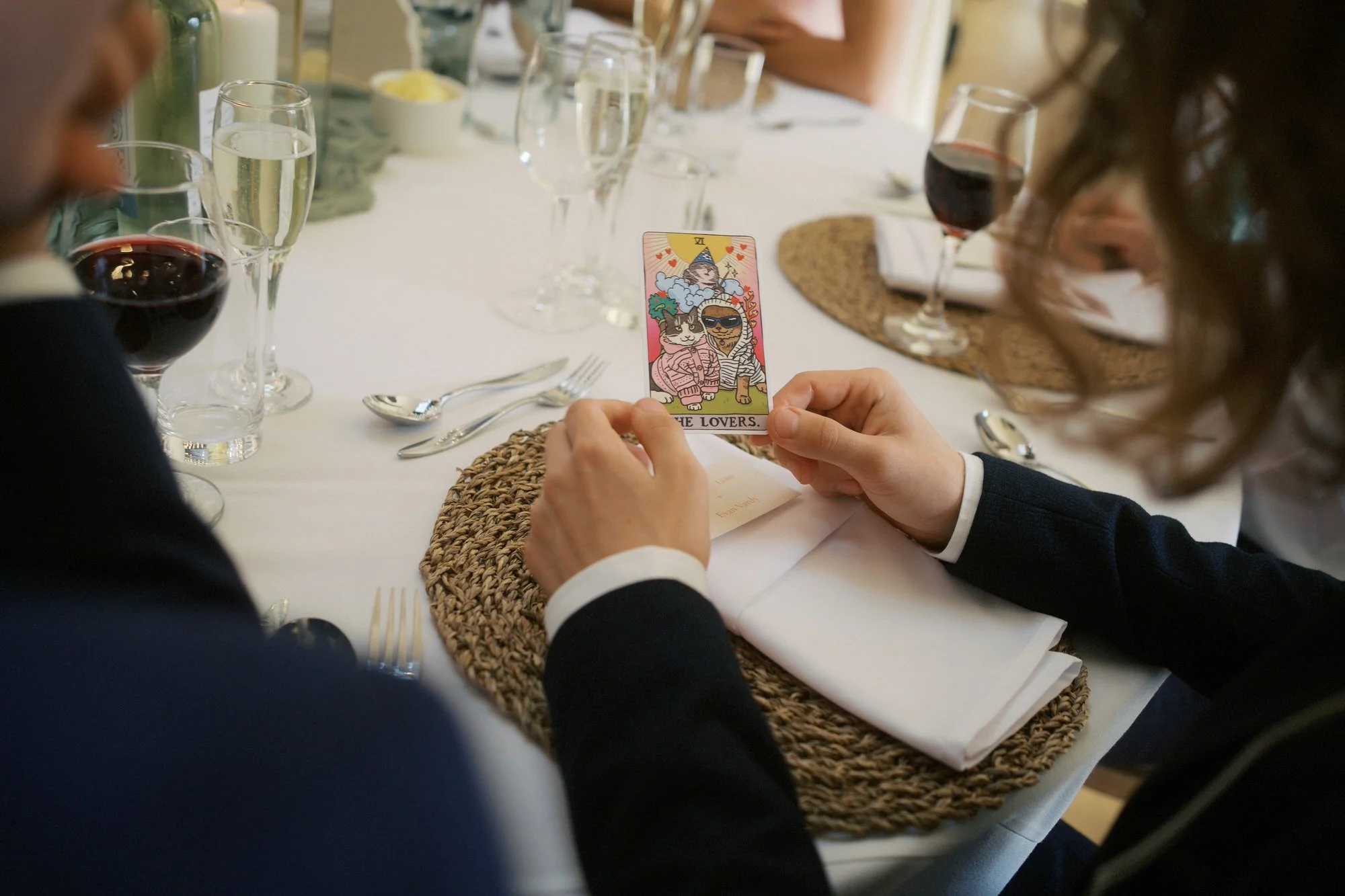  A guest holding a cat tarot card, The Lovers, used as a place name, The Pumping House, Ollerton 