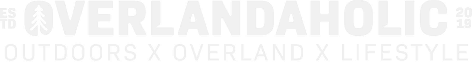 Logo for OVERLANDAHOLIC, an outdoor, overland, and lifestyle blog, featuring a pine tree icon.