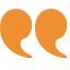 Two orange quotation marks.