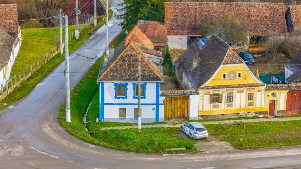 €115,000