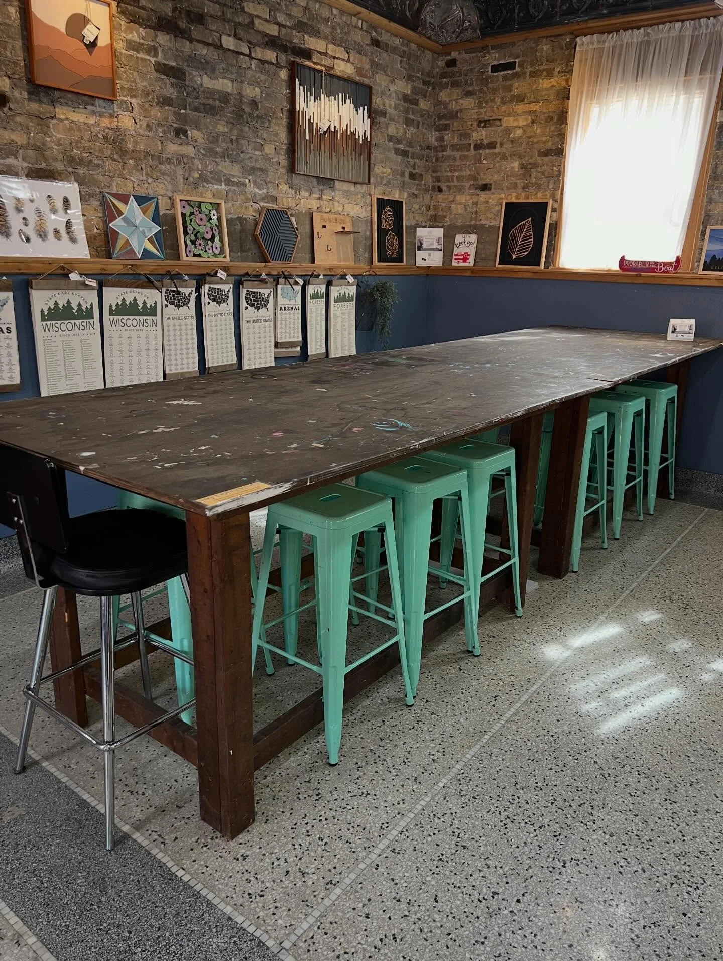 🌟 FOR SALE! 🌟 
Our TWO workshop tables and stools are for sale! 7 ft long, 4ft wide, and 3 ft 4in tall. The top comes off for easy transport. Includes 12 teal metal stools. See pictures. $440 cash for all! Great for workshops as there are already p