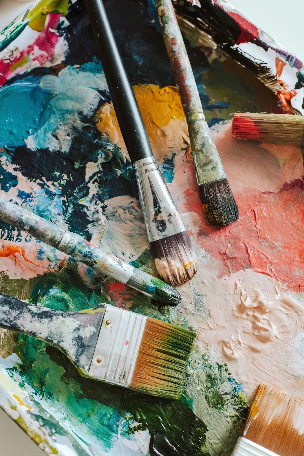 Messy paint palette from creative workshops run by Beth Elsdon