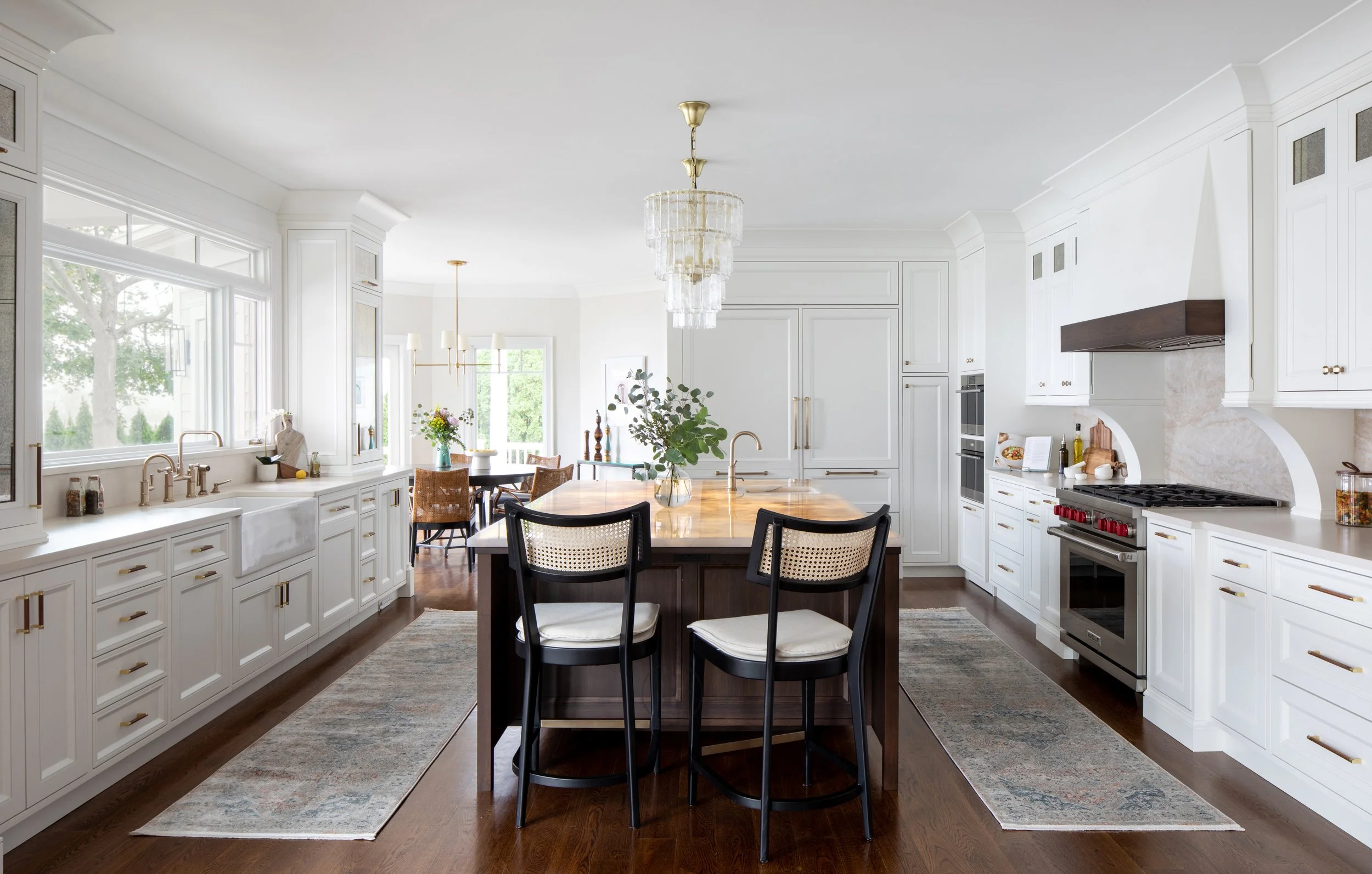 Full Kitchen remodel with custom cabinetry. Center-Island with custom lighting features. Cabinet panel refrigerator 
