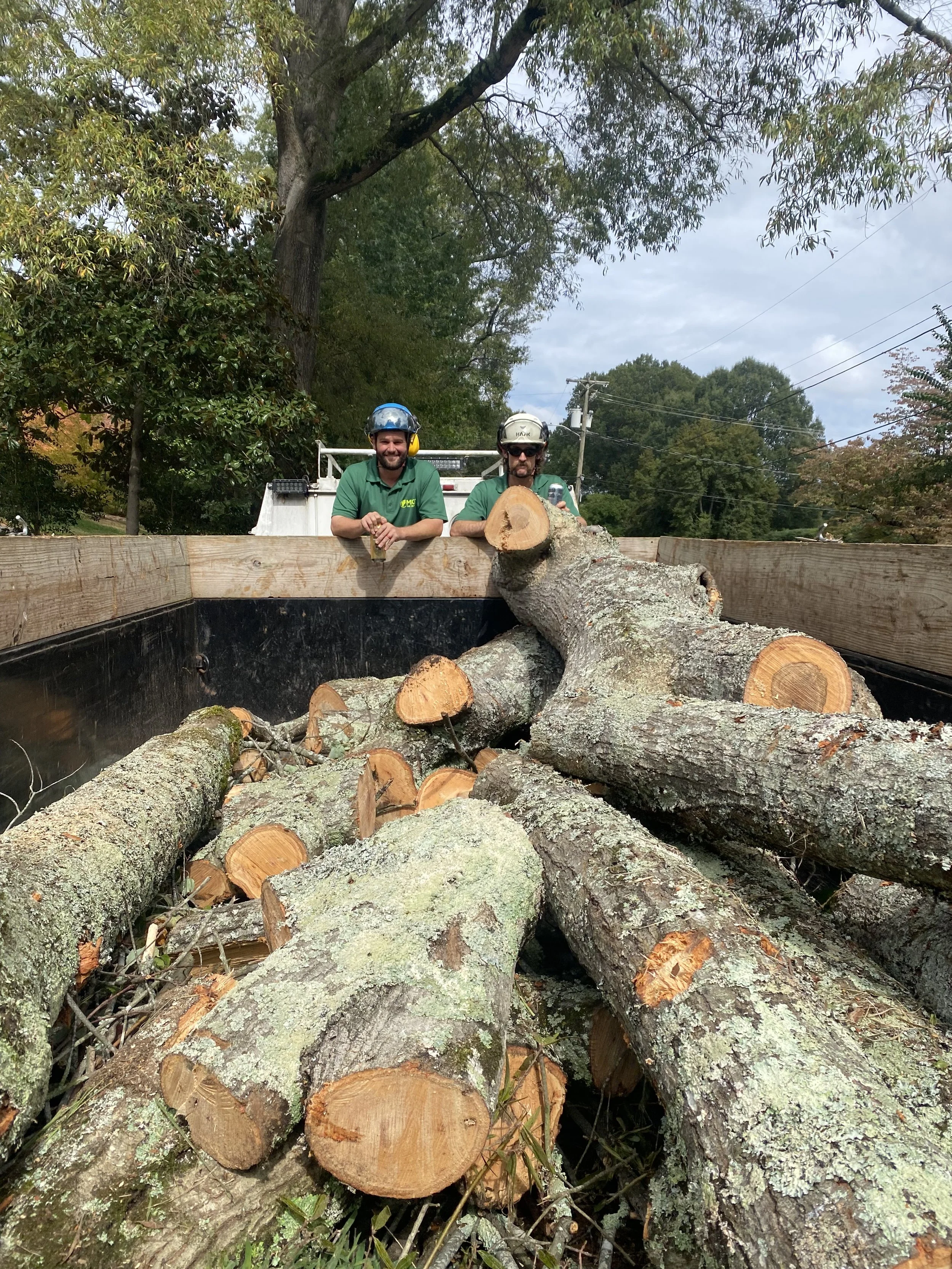 Nearing the end of the removal Mike and Dustin take a break and grab a seltzer water.