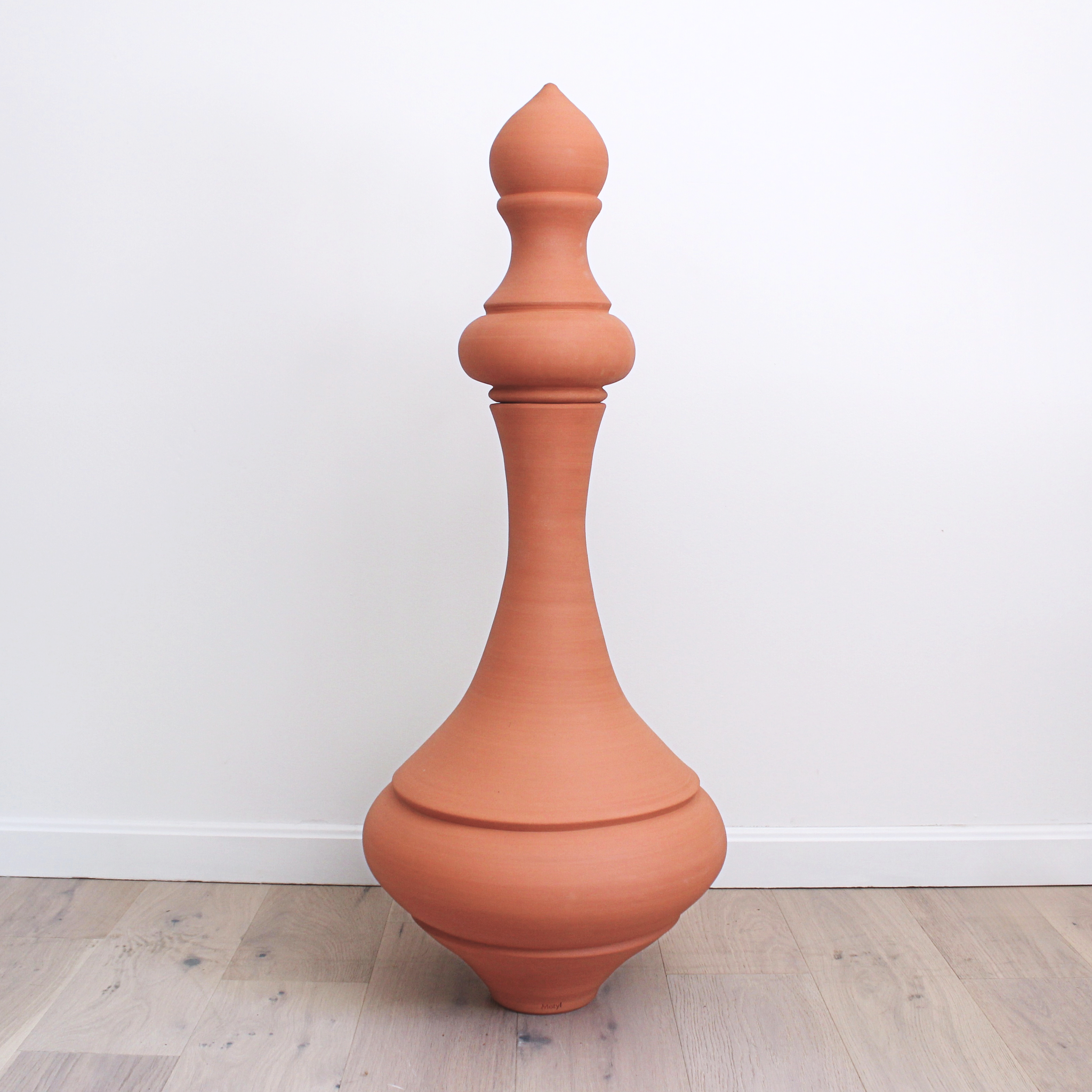 tall-terracotta-pot-perfume-bottle.png