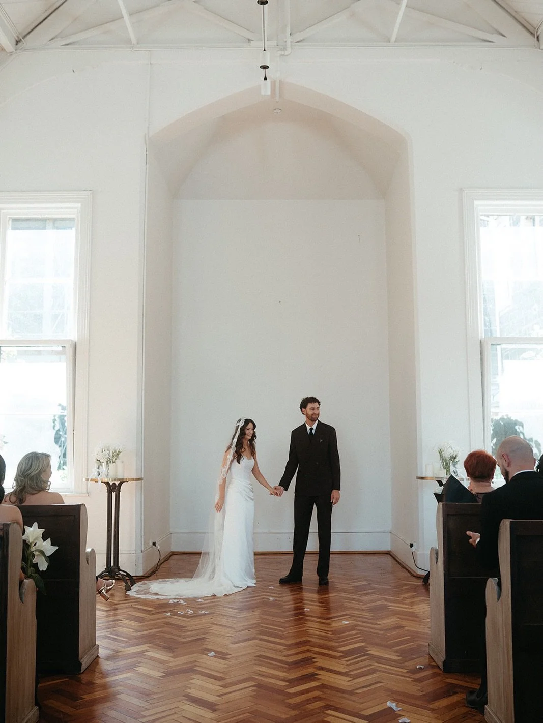 Stunning bride Chanel wearing her bespoke Curator The Label gown and our delicate Princess Lace Veil.