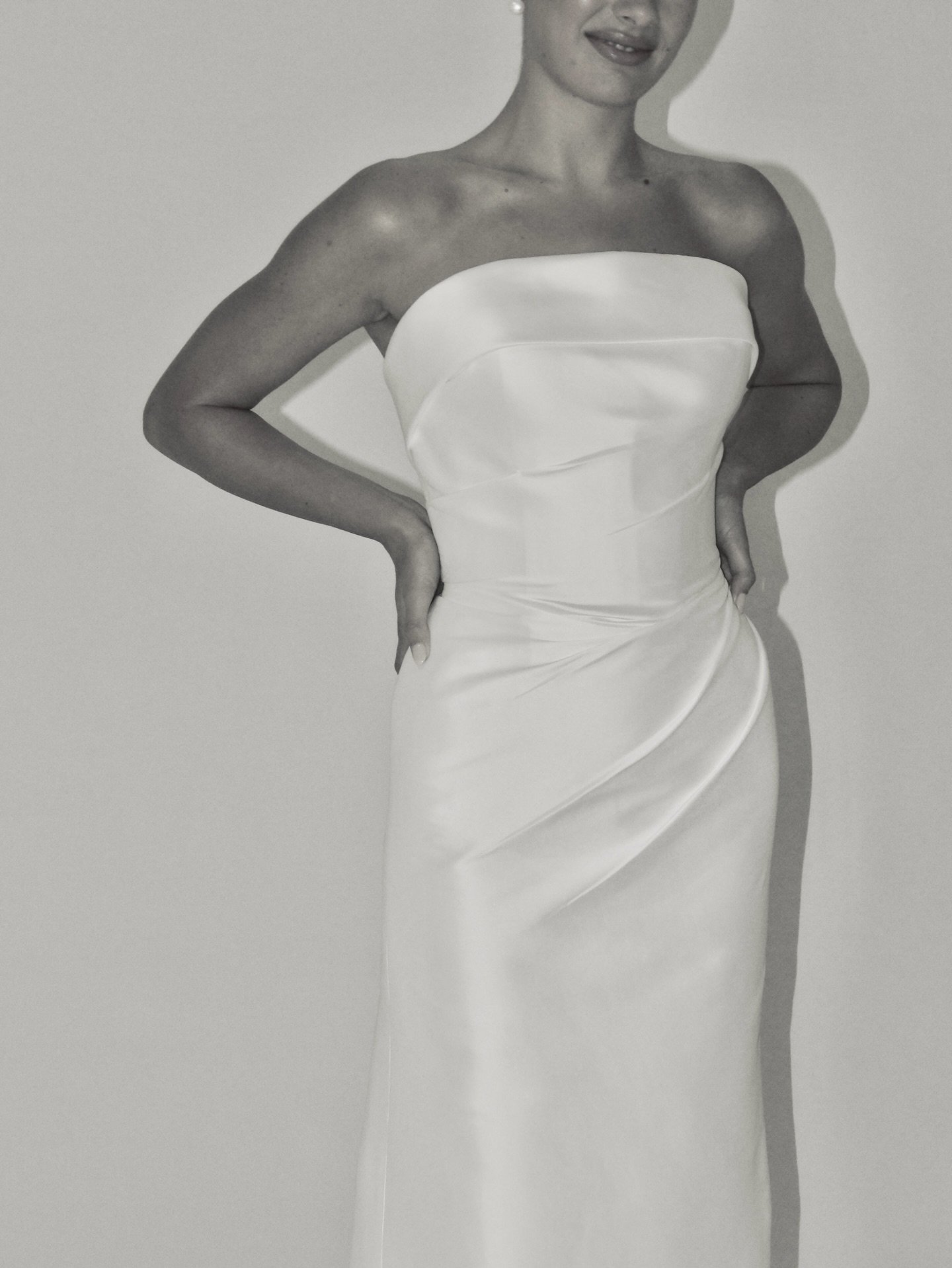 A quiet and refined elegance, showcased in the beautiful Ava Gown. Available at select stockists.