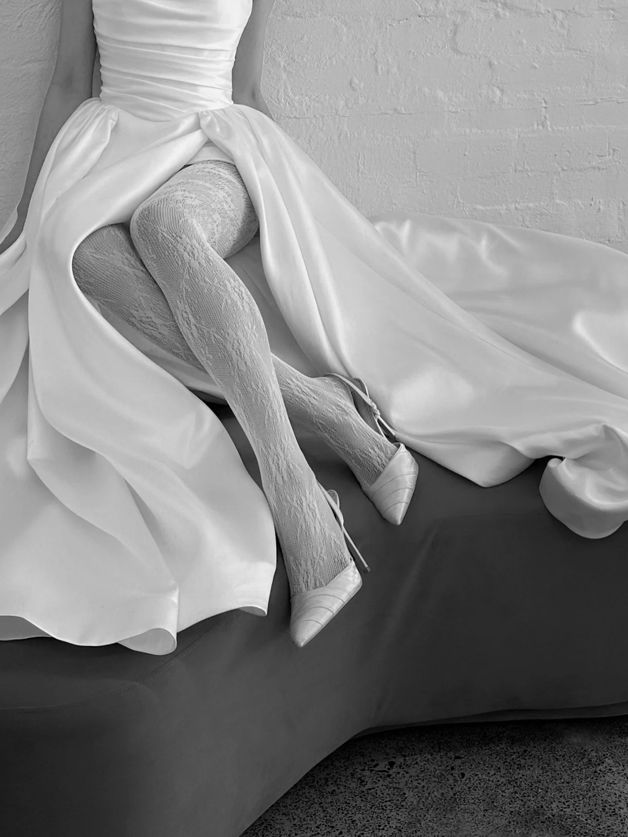 A classic A-line mikado gown, designed with intricate draping and structure in mind. 

Available at our select stockists, the Arianna is timelessly chic.