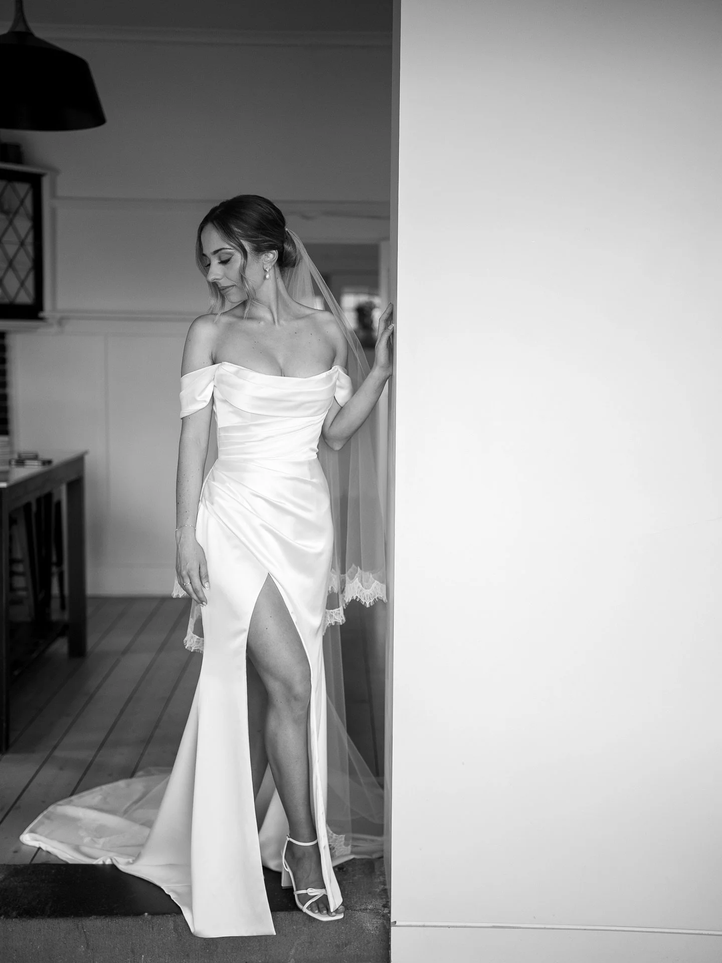 Stunning bride Julia wearing her bespoke Curator The Label, Melissa Gown with a bespoke sleeve. 

Paired with this stunning gown, our classic Lace Trim veil in Chapel length.