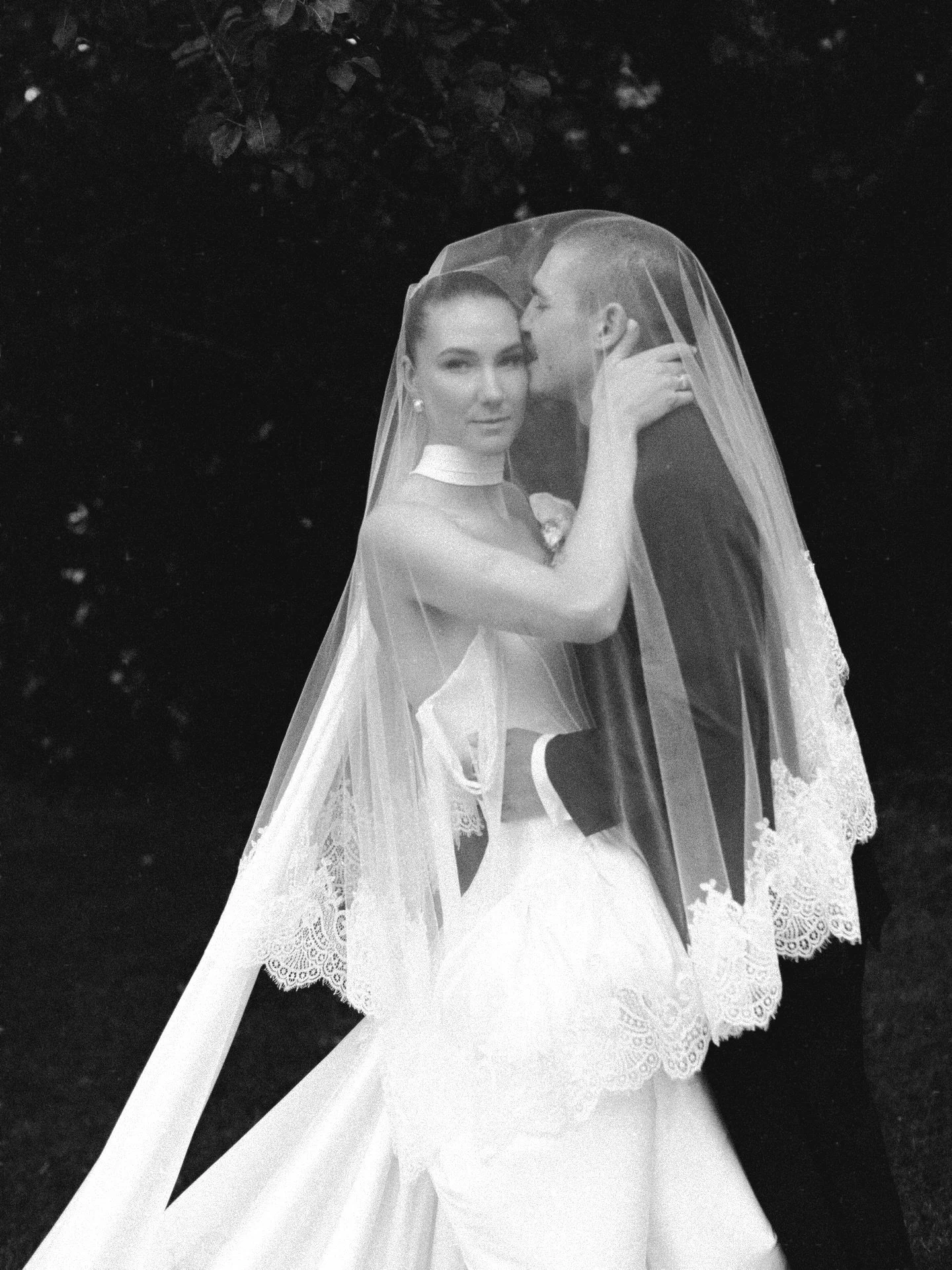 Stunning bride Hope wearing her Curator The Label, Vintage Lace Trim veil&mdash; keeping it short and sweet in the fingertip length.