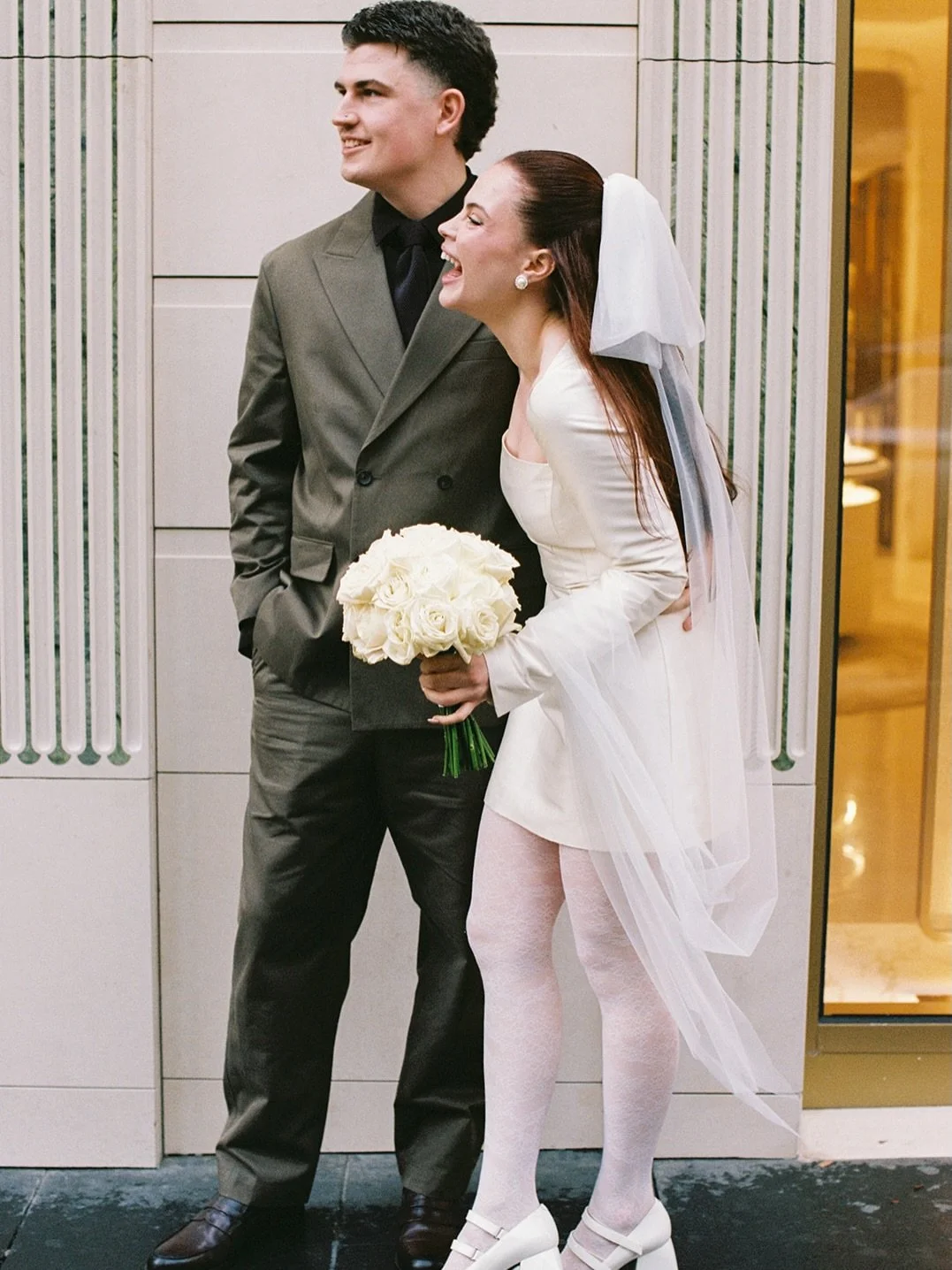 Curator The Label veils, showcasing a fun and chic look with our tulle bow veil, worn by bride Dani.
